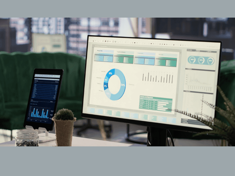 Excel dashboard on computer screen used for AI-powered data analysis in corporate setting