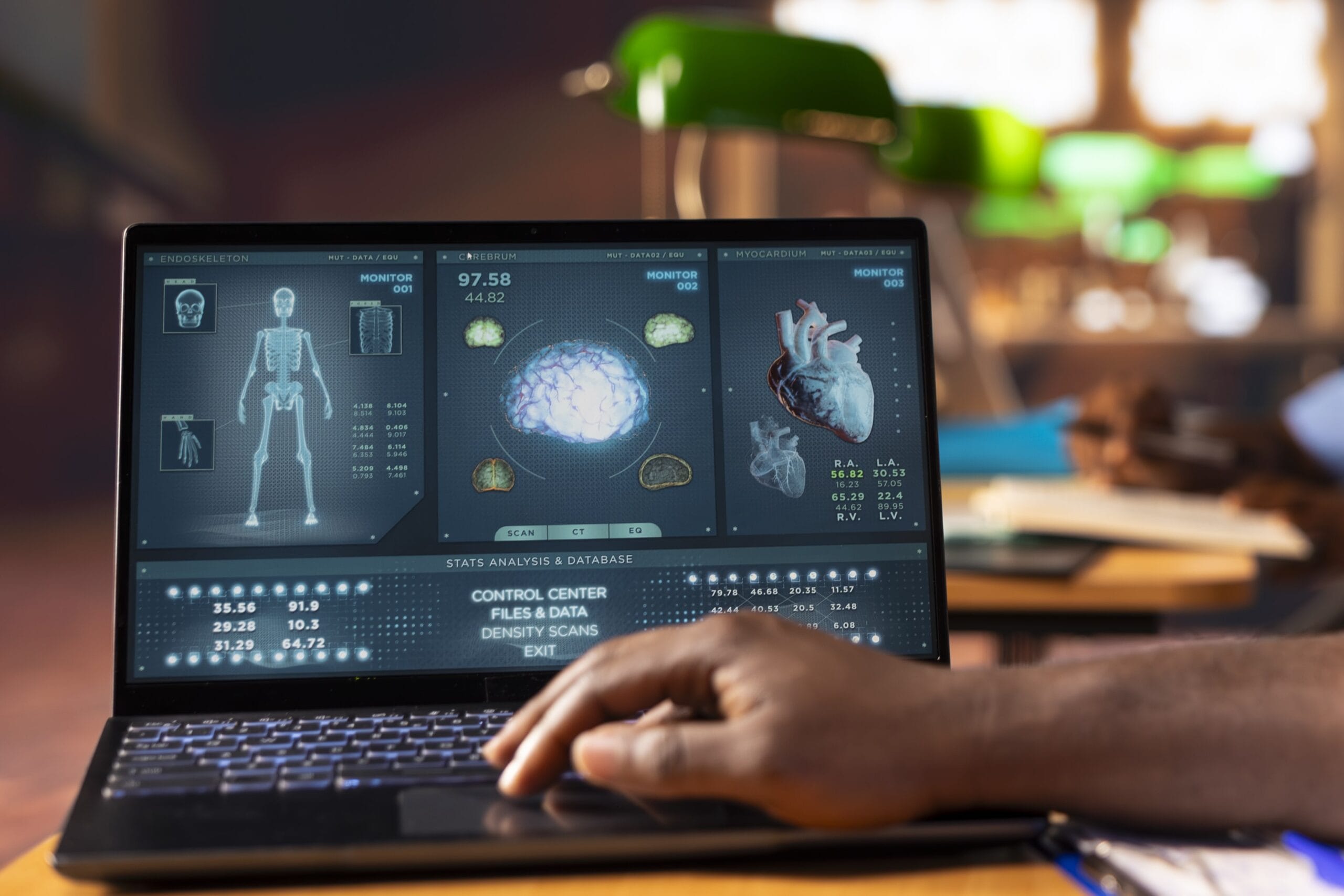 A person using an AI medical diagnosis tool on a laptop, displaying digital health data including brain, skeleton, and heart scans.