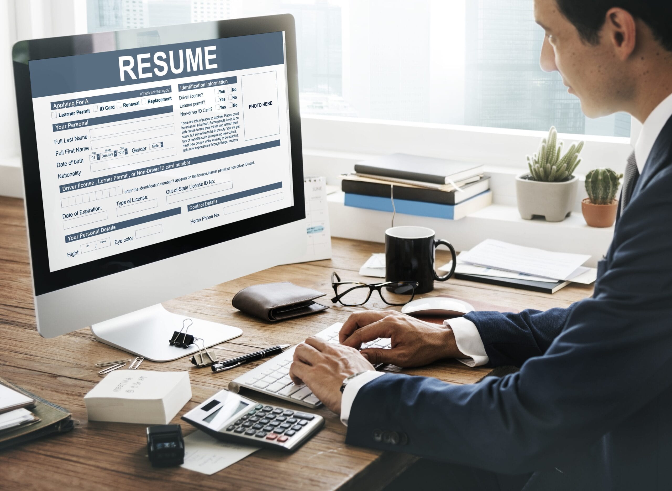 AI resume rewriter free tool optimizing a resume on a laptop screen with green checkmarks and keywords – 2025 digital concept